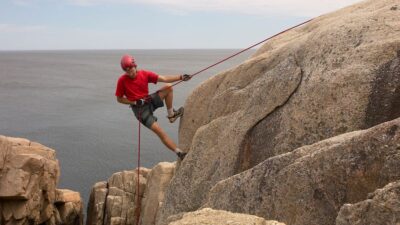 Scaling Heights: Unpacking the Thrill and Challenge of Abseiling as an Extreme Sport